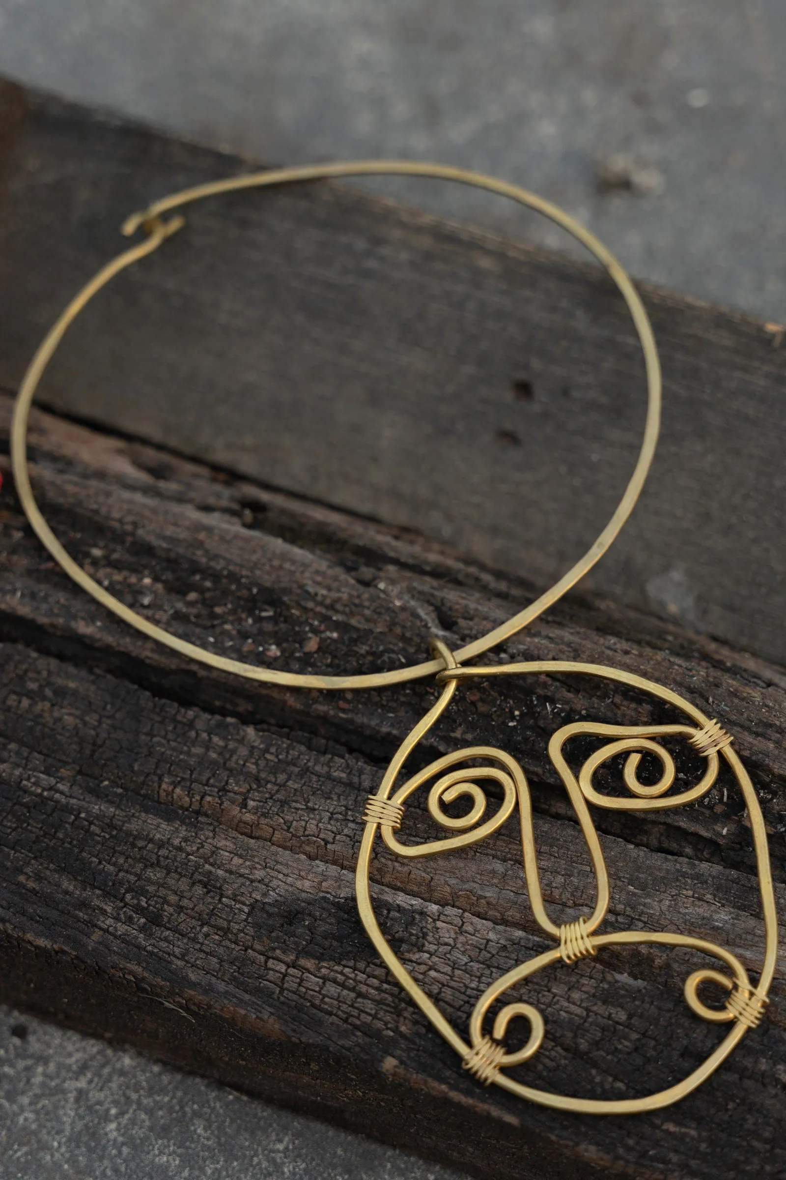 Handmade Dokra Brass Abstract Face Spiral Necklace - Unique Artistic Statement Jewelry