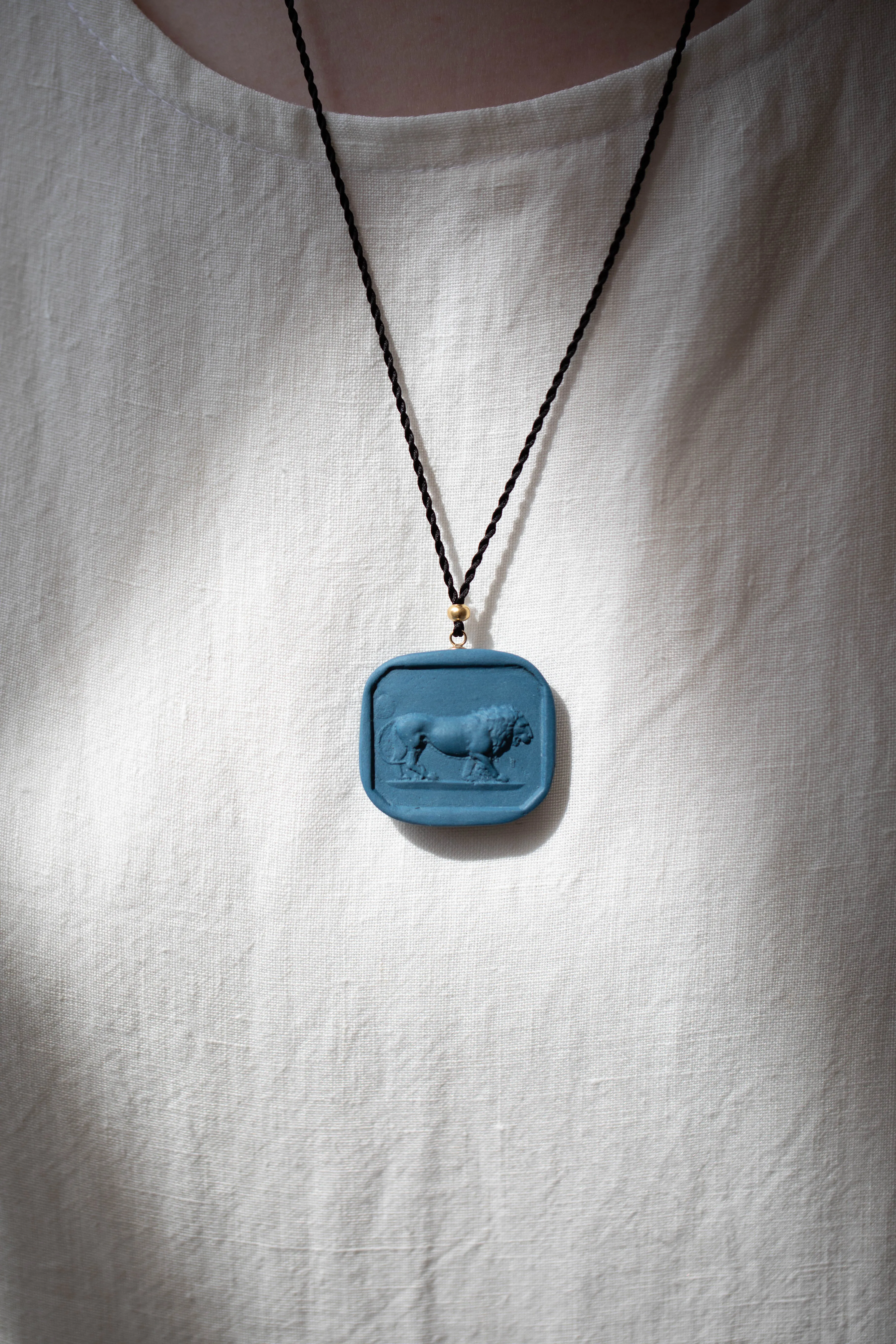 Marcie McGoldrick | Porcelain Cameo Pendant- Leo in Indigo