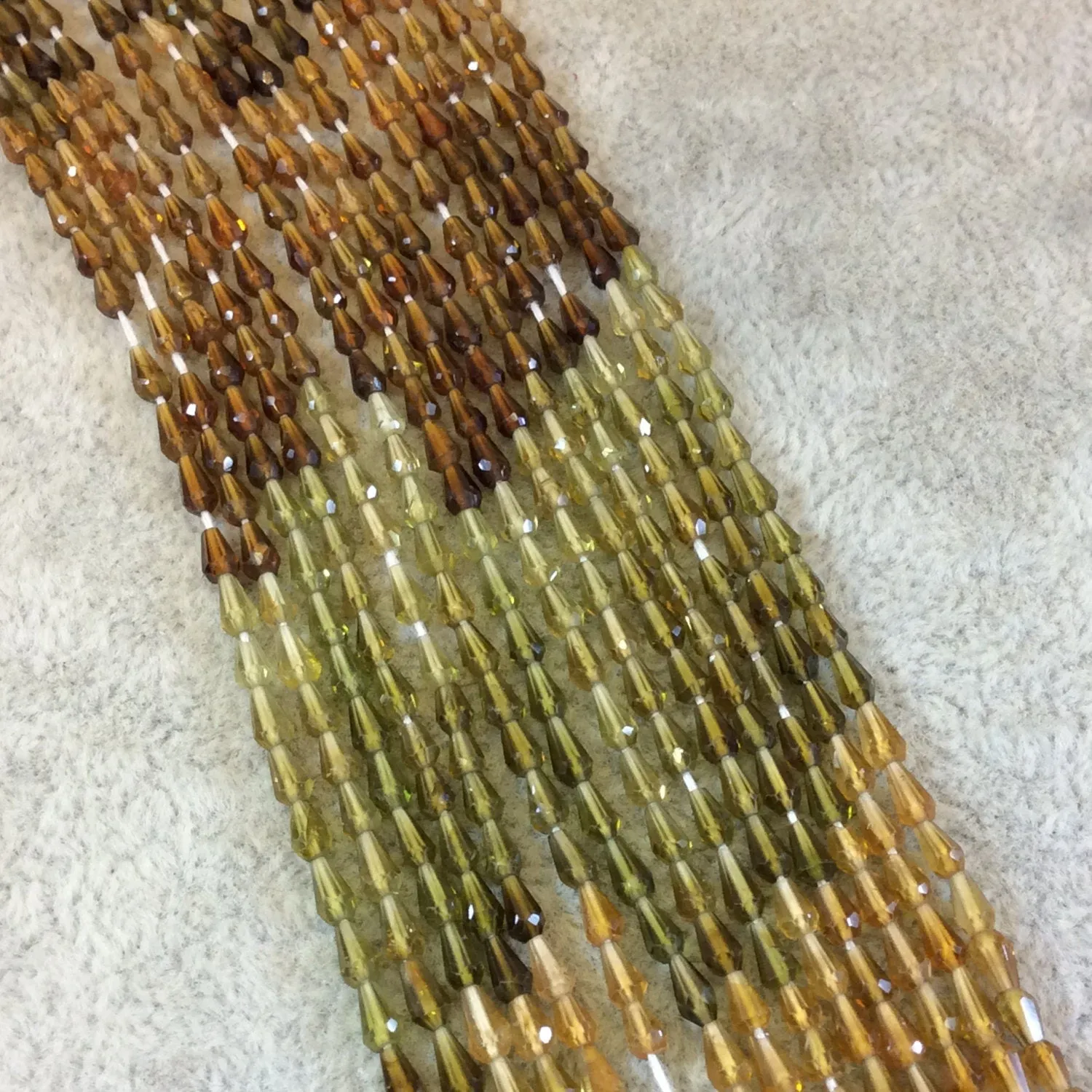 Petro Tourmaline Teardrop Beads | Faceted Center-Drilled Vertical Gemstone Beads | Mixed Browns/Greens | 3mm x 5mm | 13" Strand (Approx. 81 Beads)