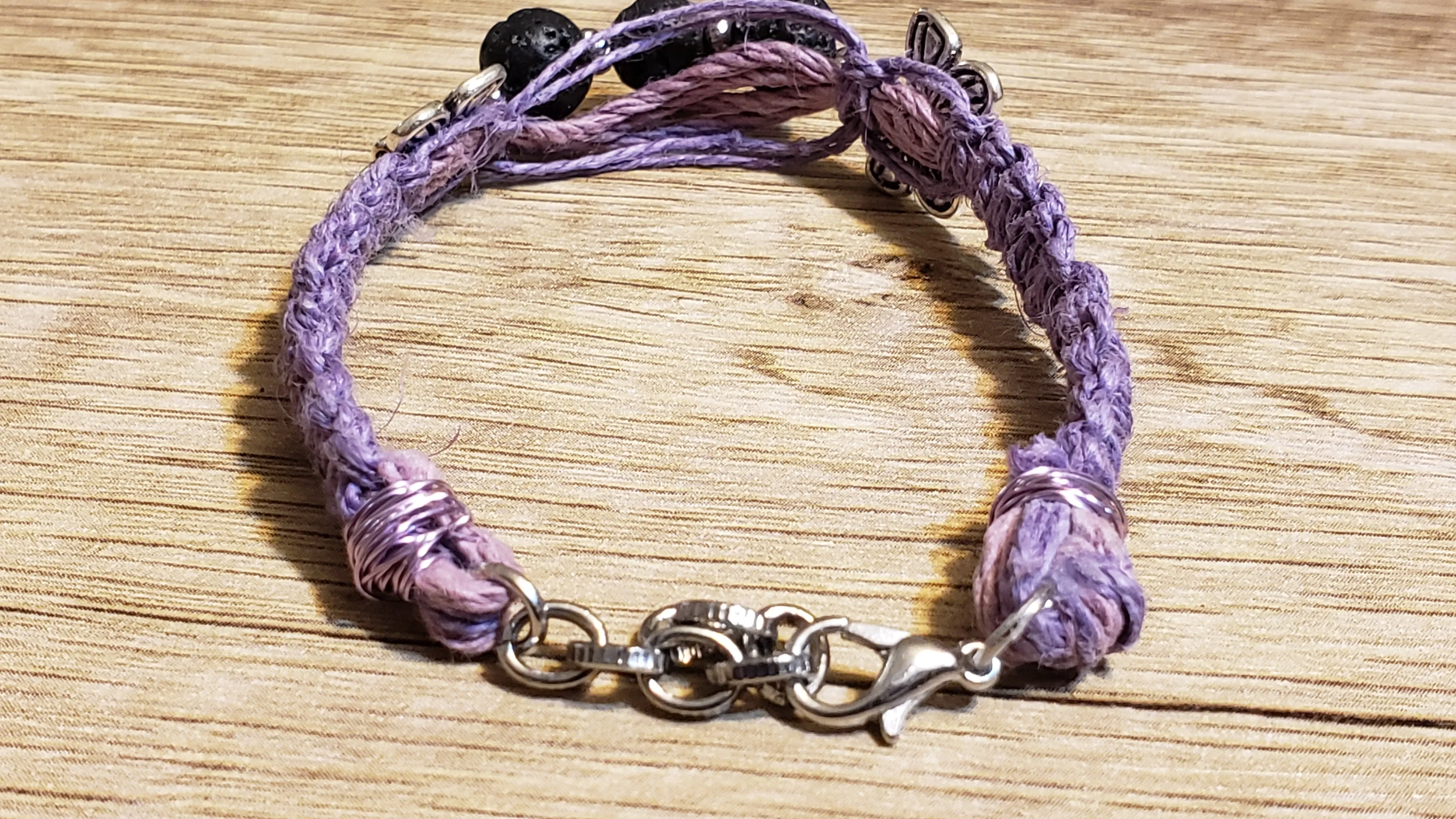 Purple Natural Hemp Bracelet with Lava Rocks and Silver Plated Butterly Accents. Adjustable Non Tarnish Chain with Lobster Claw Clasp